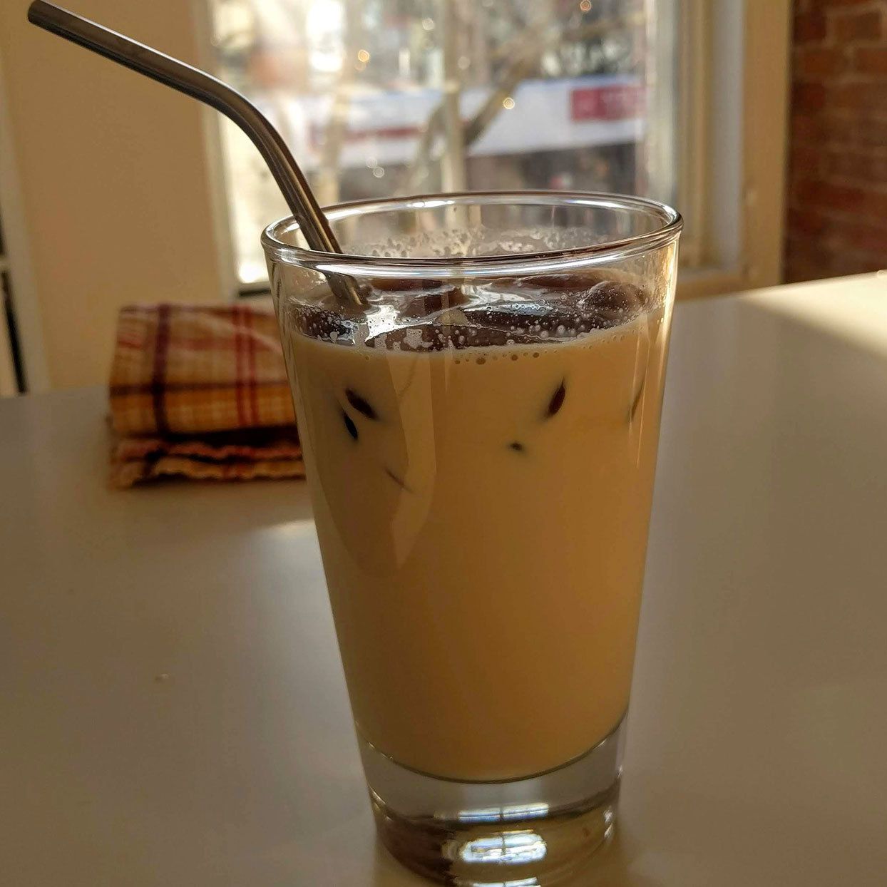 Kori Kohi Iced Coffee in a Glass with Metal Straw