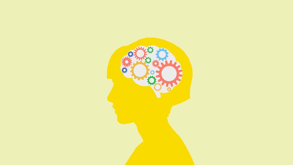 Silhouette of a woman with a brain overlaid with gears