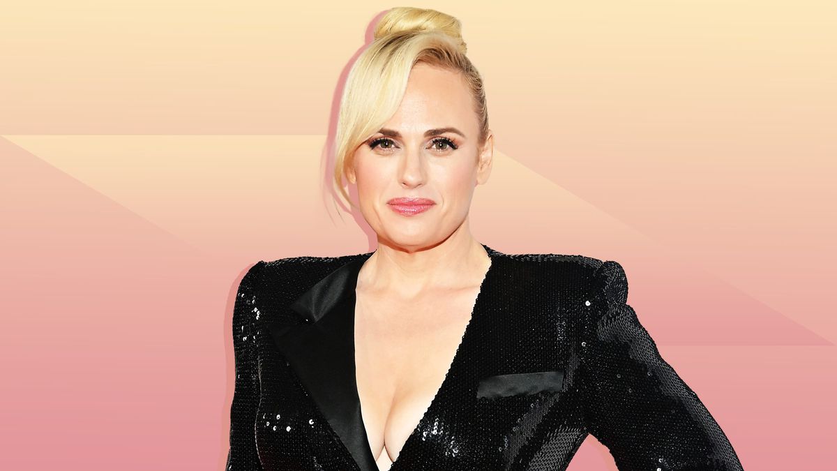 Rebel Wilson Has a 'Babewatch' Moment As She Walks on the Beach in an Orange Swimsuit
