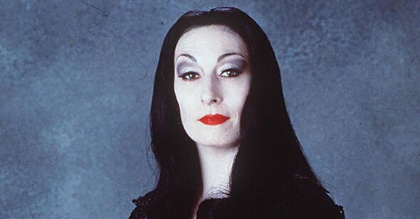 Why Were Still Crushing Hard On Morticia Addams HelloGiggles