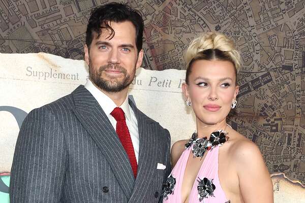 Henry Cavill and Millie Bobby Brown and Harry Bradbeer attend the Netflix Enola Holmes 2 Premiere on October 27, 2022 in New York City.