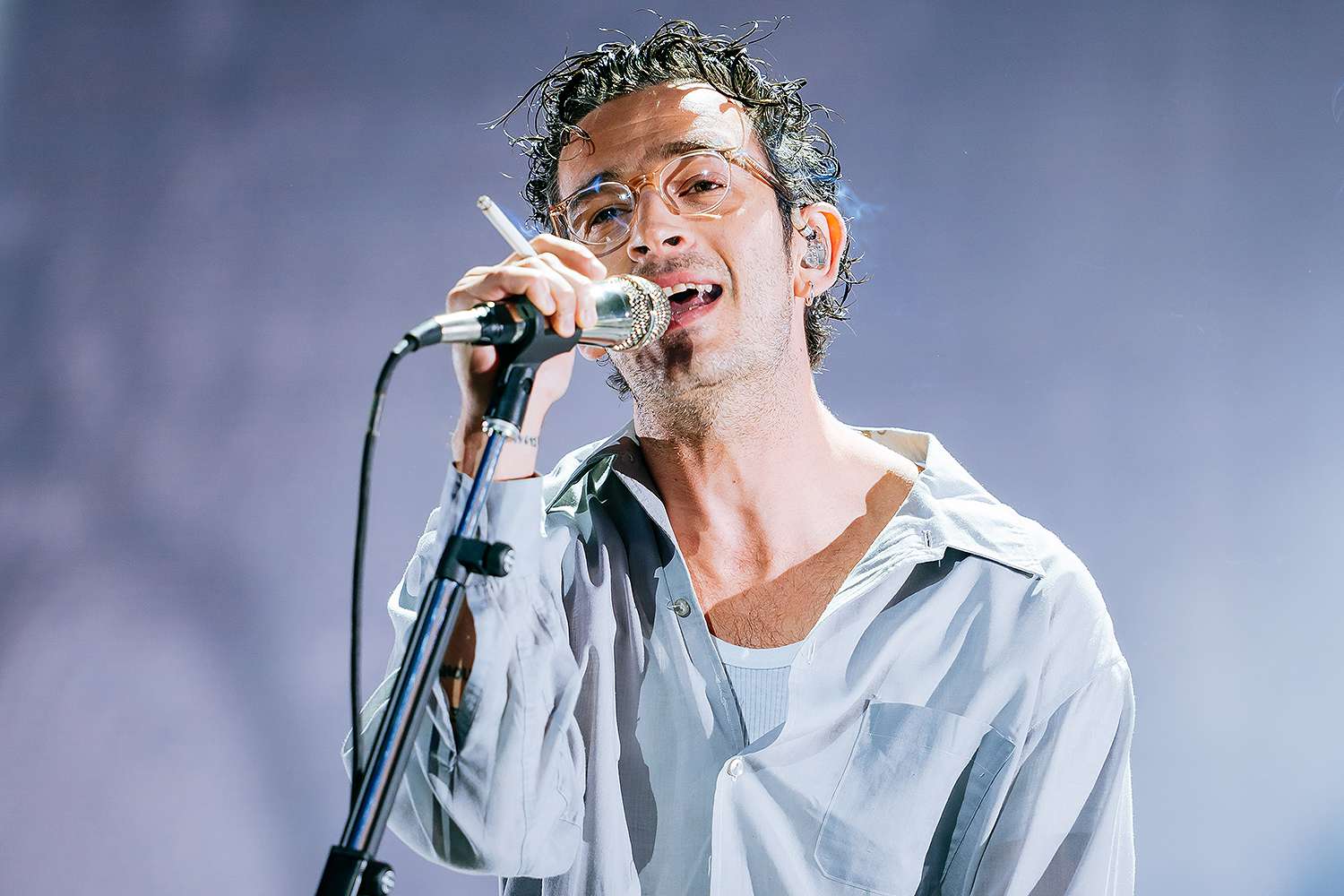 Malaysia halts music fest after Matty Healy kisses bandmate on stage