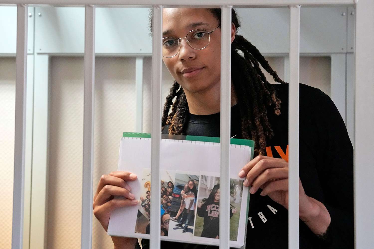 WNBA star and two-time Olympic gold medalist Brittney Griner holds images standing in a cage in a courtroom prior to a hearing at the Khimki City Court outside Moscow, Russia, 27 July 2022. Griner, a World Champion player of the WNBA's Phoenix Mercury team was arrested in February at Moscow's Sheremetyevo Airport after some hash oil was detected and found in her luggage, for which she now could face a prison sentence of up to ten years. US basketball player Brittney Griner attends hearing on drug charges, Moscow, Russian Federation - 27 Jul 2022