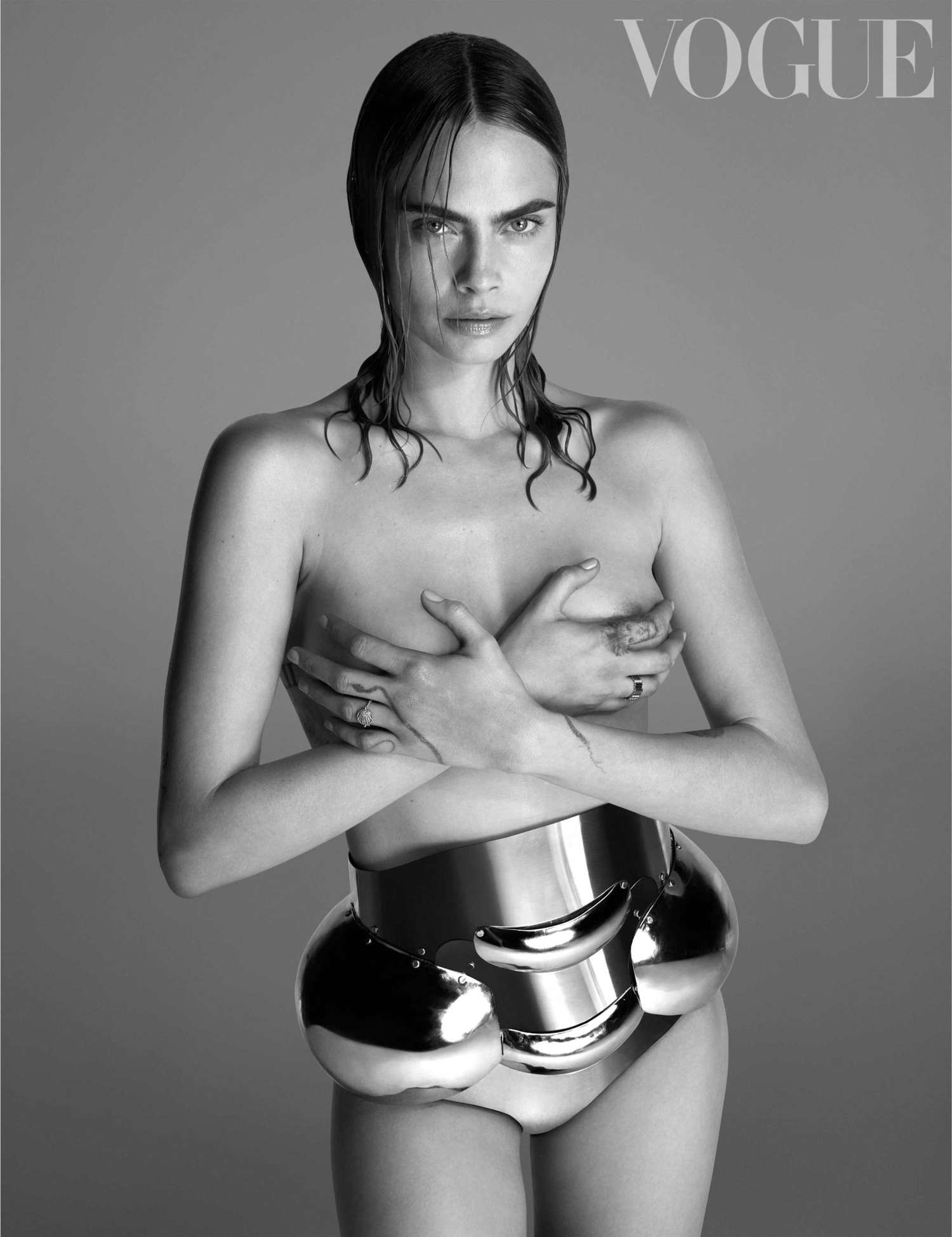 Cara Delevingne Goes Topless and Says 'It's All of Our Jobs' to Fight for Women's and Trans Rights