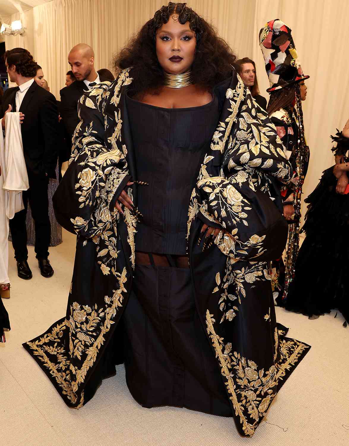 Lizzo Goes for Drama in Embroidered Coat and Brings Special Met Gala Accessory — Her Flute!