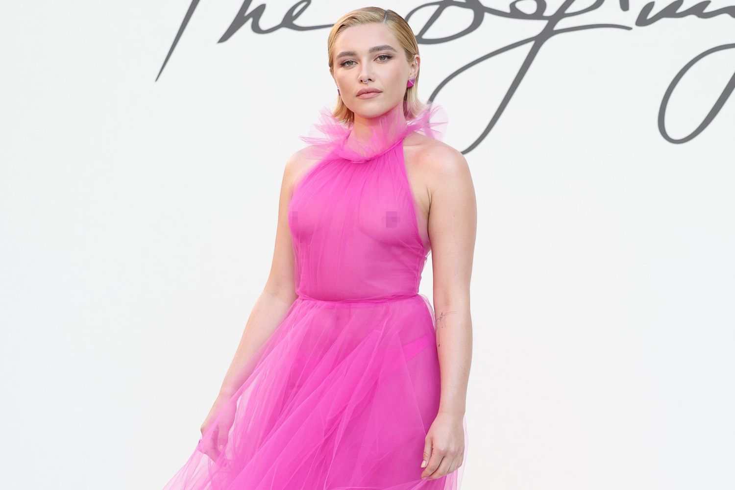 Florence Pugh Takes on the Barbie-Pink Trend in a Daringly Sheer Dress – See Photos