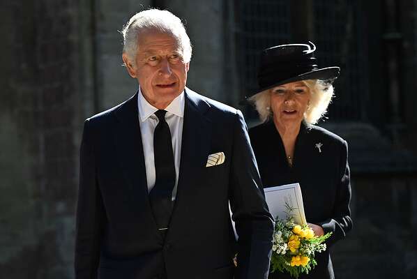 King Charles III and Camilla, Queen Consort depart following a Service of Prayer and Reflection for the Life of The Queen at Llandaff Cathedral