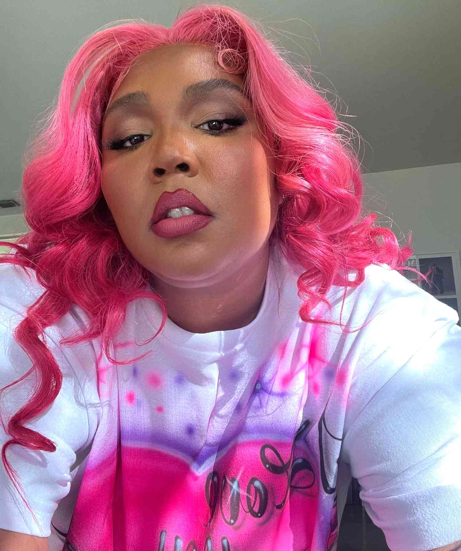 Lizzo Shows Off Fabulous New Hot-Pink Hair as She Dances to ‘GRRRLS’ on Instagram