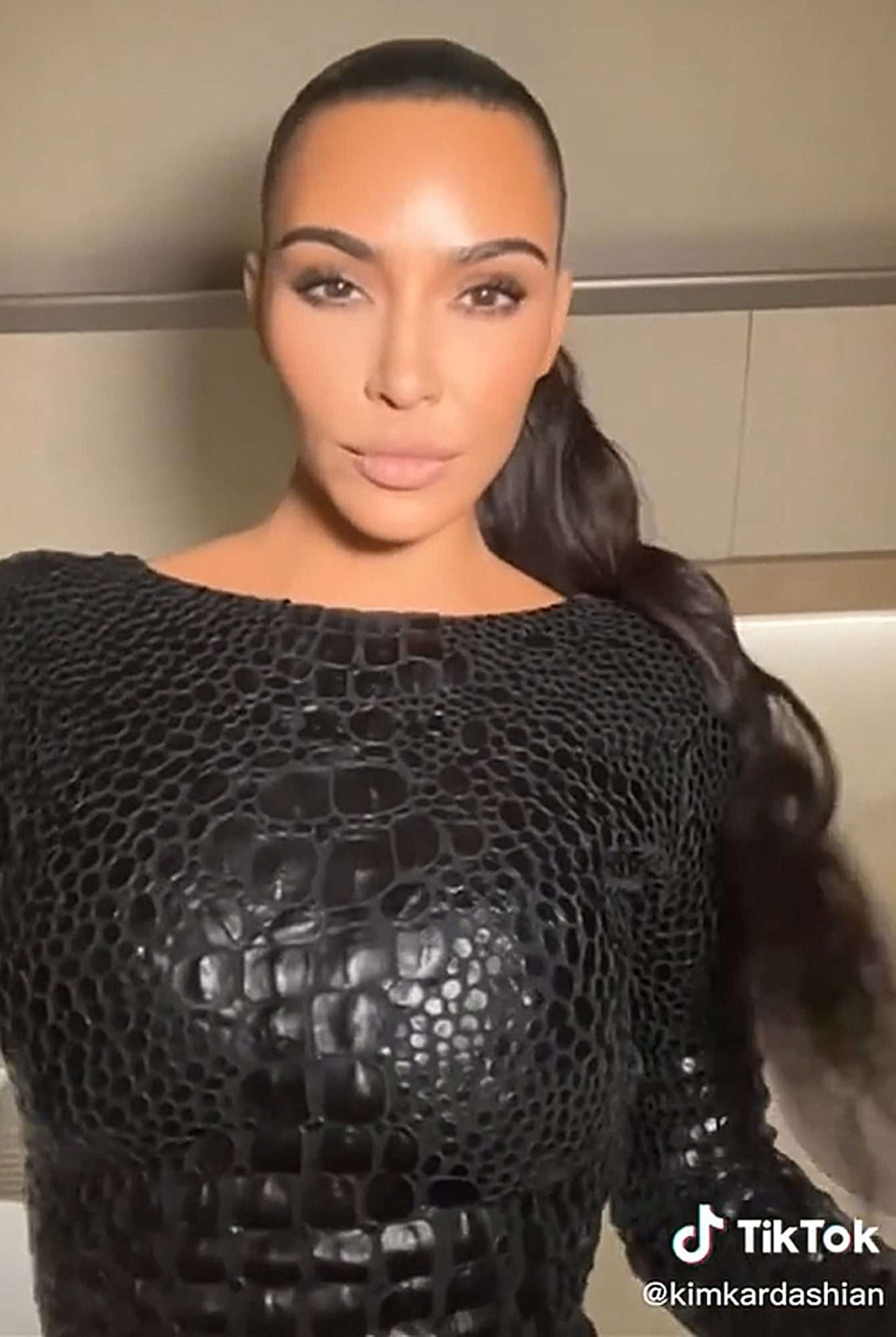 Kim Kardashian Makes Solo TikTok Debut with OG Glam Squad, Shows Off Long Black Nails
