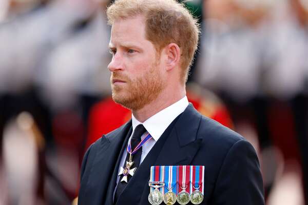 Prince Harry, Duke of Sussex walks behind Queen Elizabeth II's coffin as it is transported on a gun carriage from Buckingham Palace to The Palace of Westminster ahead of her Lying-in-State on September 14, 2022 in London, United Kingdom. Queen Elizabeth II's coffin is taken in procession on a Gun Carriage of The King's Troop Royal Horse Artillery from Buckingham Palace to Westminster Hall where she will lay in state until the early morning of her funeral. Queen Elizabeth II died at Balmoral Castle in Scotland on September 8, 2022, and is succeeded by her eldest son, King Charles III.