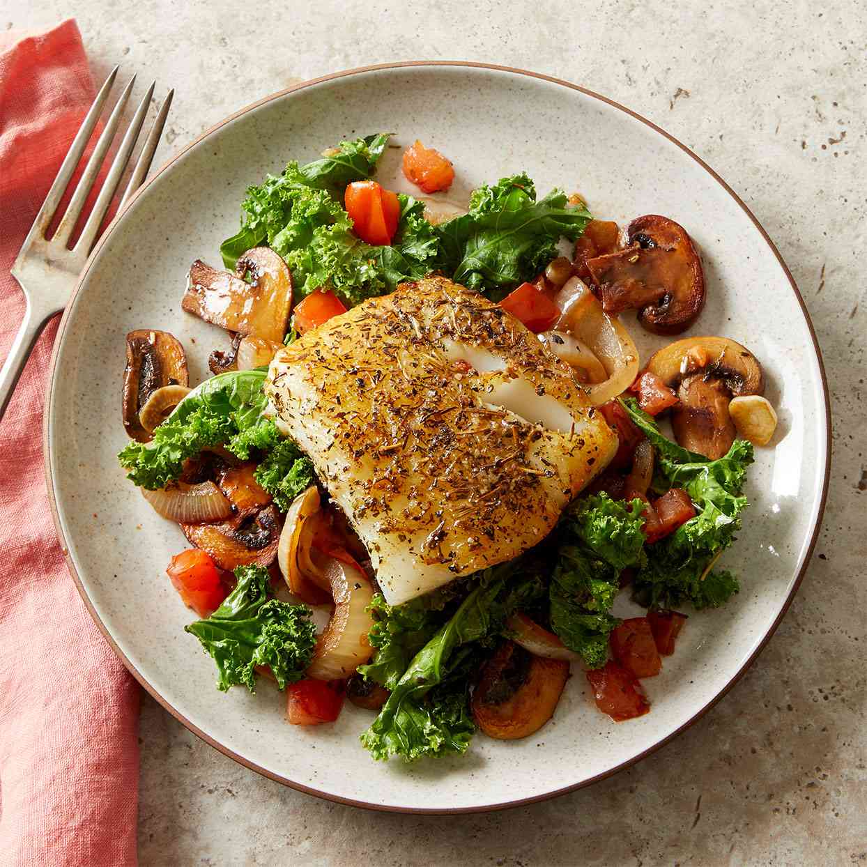 Herby Mediterranean Fish with Wilted Greens & Mushrooms