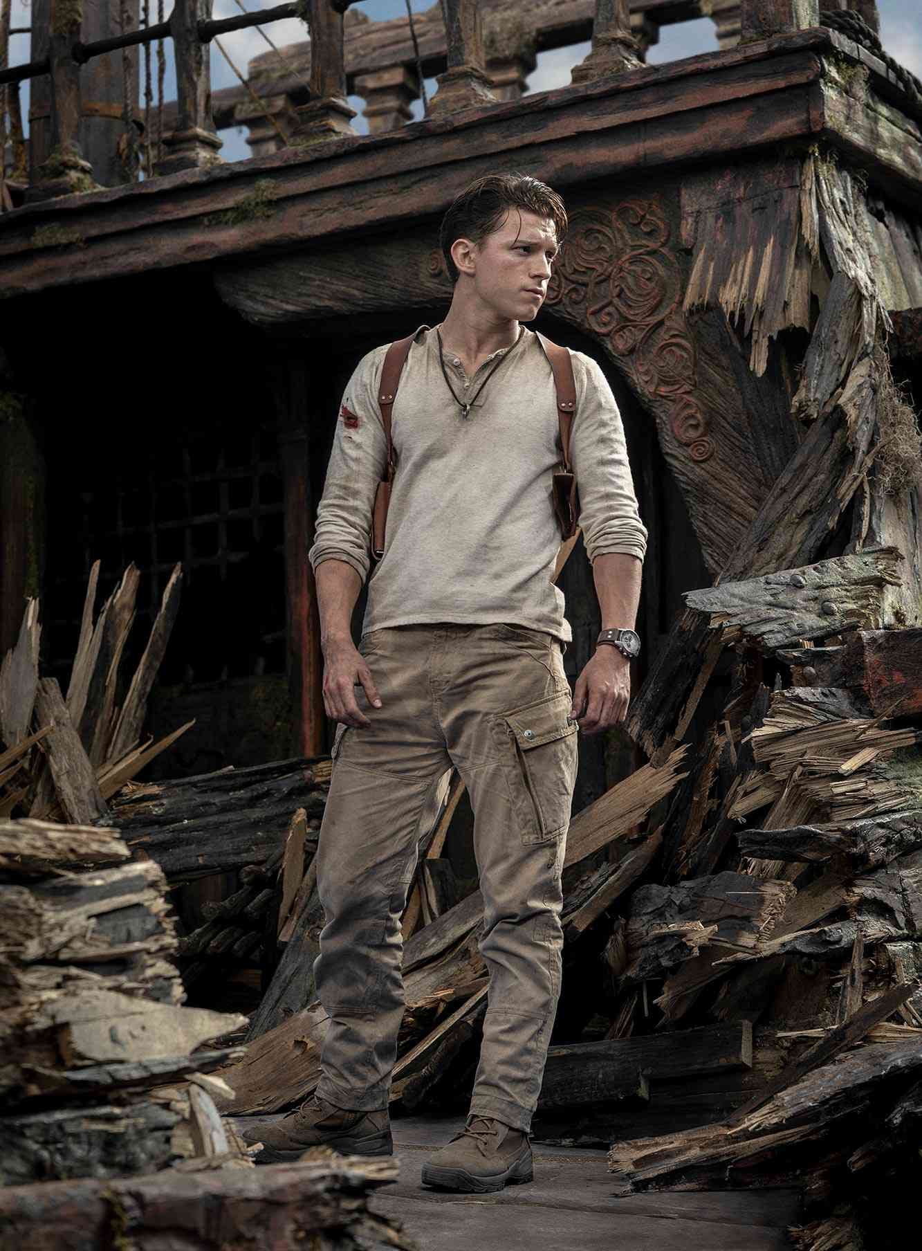 Uncharted movie's Tom Holland meets the original Nathan Drake in first look at set | EW.com