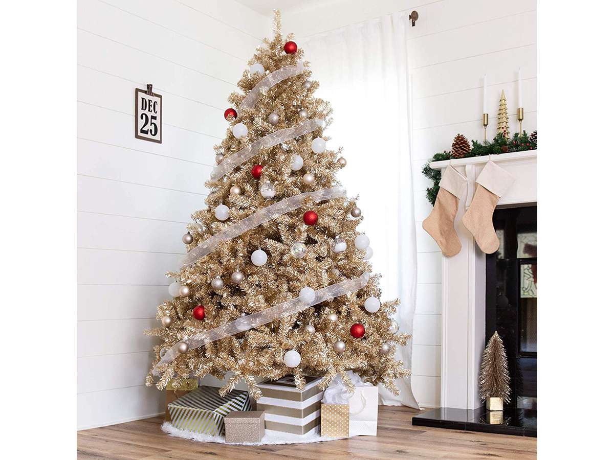 9 Gold Christmas Trees To Light Up Your Living Room Southern Living
