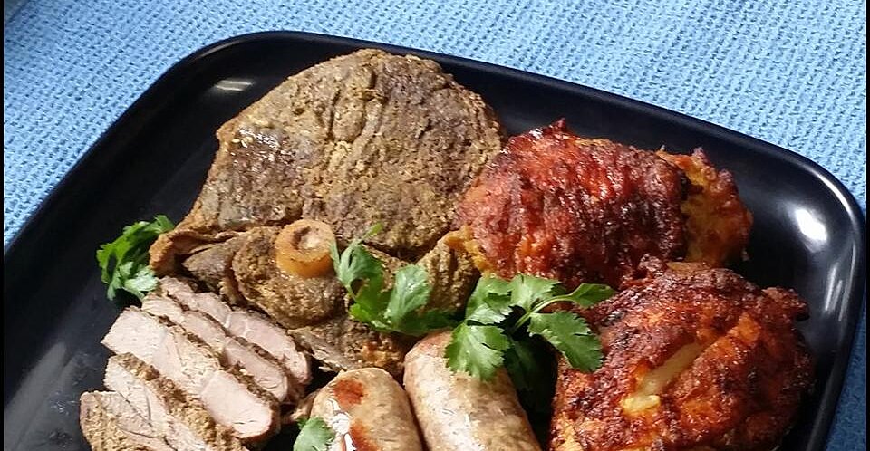 Mixed Grill Of Sausage Chicken And Lamb With Tandoori Flavorings