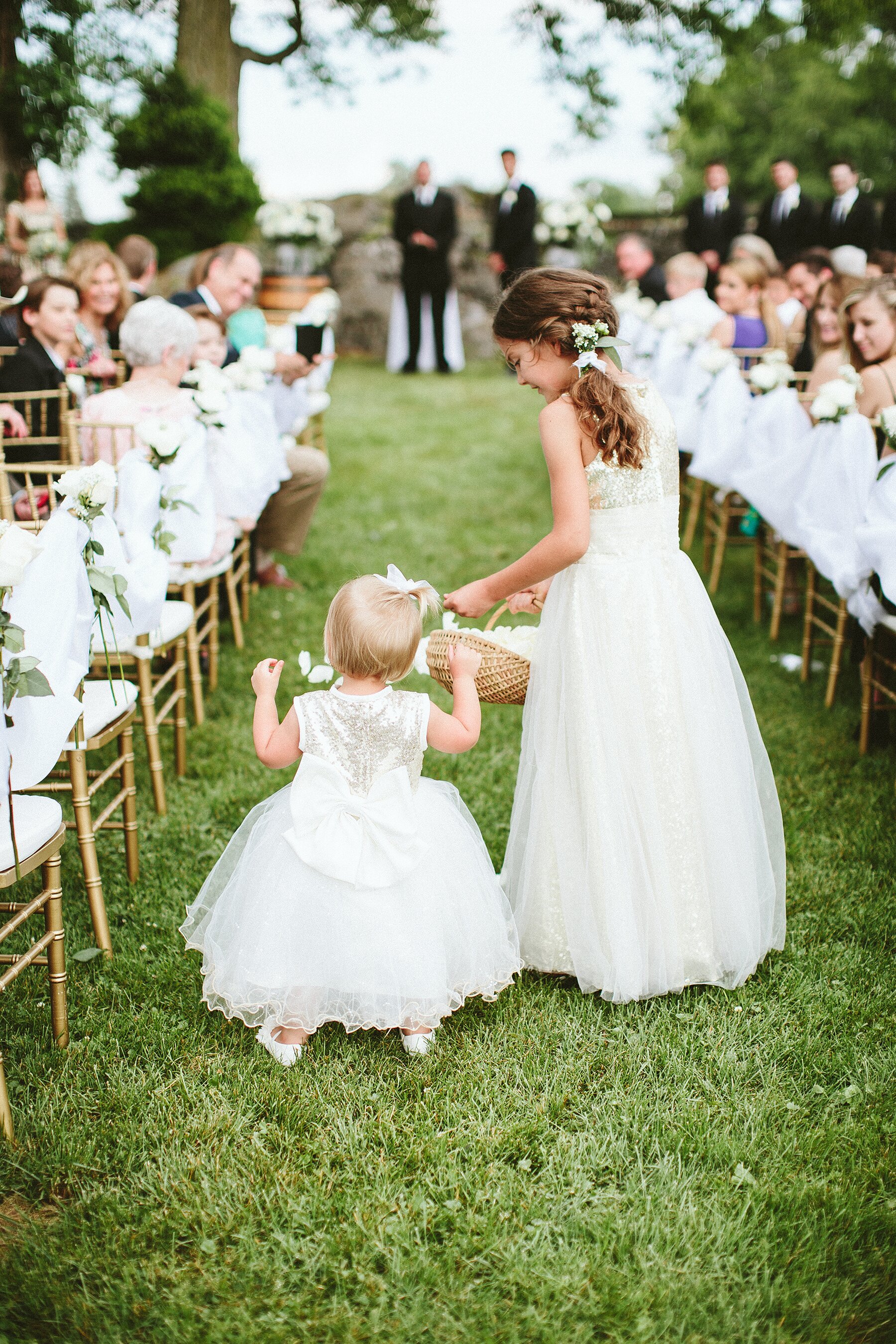 Read This Before Asking Your Flower Girl To Toss Petals Down