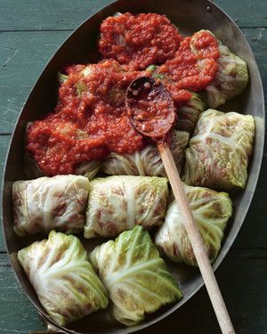 Stuffed Savoy Cabbage with Beef, Pork, and Rice in a Spicy Tomato Sauce 