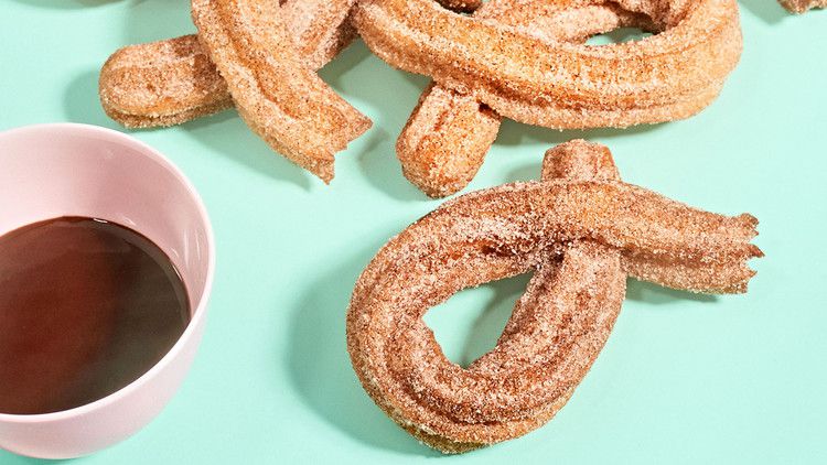 churro twists with bowl of melted chocolate