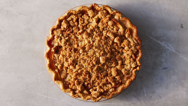 apple crumble pie on gray countertop