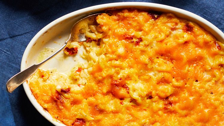 pimiento mac and cheese served in a white casserole dish