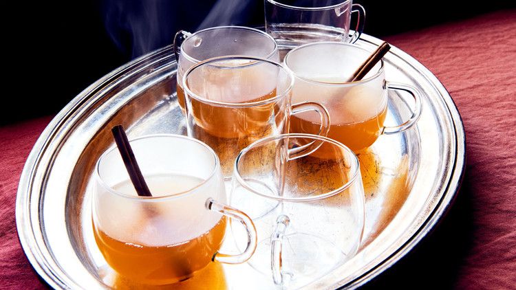 mulled lillet wine with cinnamon sticks