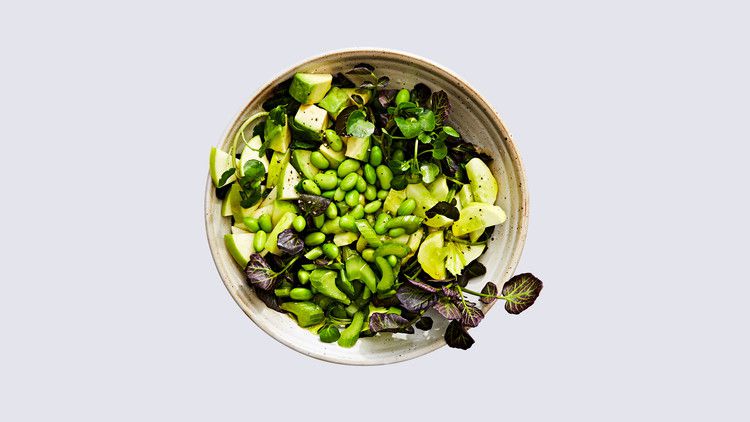 watercress chopped salad topped with edamame