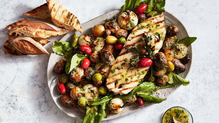 Grilled Halibut Steaks with Potatoes, Olives, and Onions 