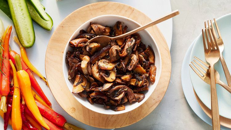 pan-roasted marinated mushrooms served in a bowl