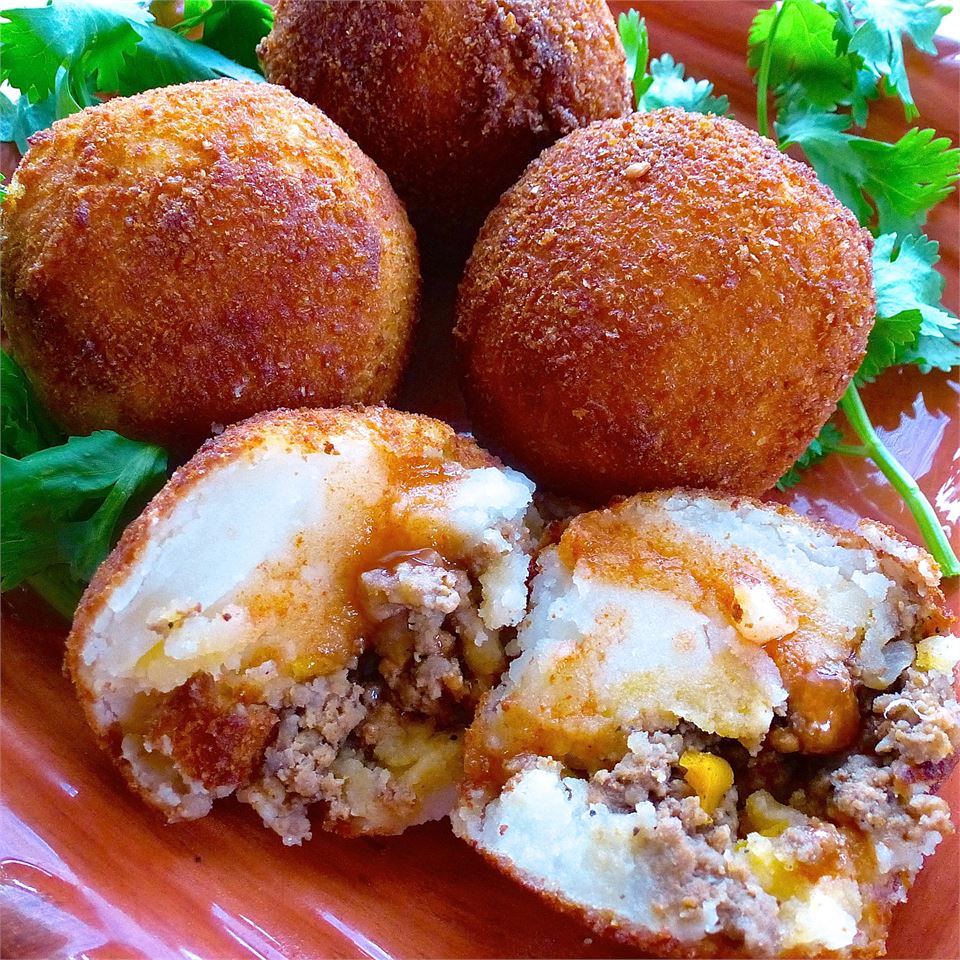 <p>Perhaps created to counter the effects of mezcal-laden revelry, this potato croquette&mdash;first stuffed with meat, cheese, and spices, then fried&mdash;is a fabulously addictive bite. Some are served with creamy or spicy dipping sauces. Whether you're enjoying it solo on the sidewalk or with friends at a party, papas rellenas are a hit!</p>
                          