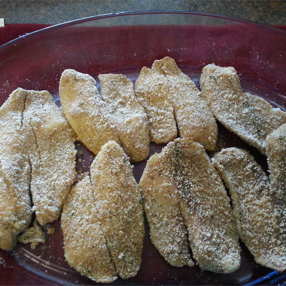 Tilapia fillets are coated with garlic- and herb-seasoned bread crumbs and other seasonings and baked. Dinner's ready in about 30 minutes. "This is a quick and easy recipe that does not have all the fat of traditional fried tilapia," says Lehart75. "Try this delicious breaded meal tonight!"
                          