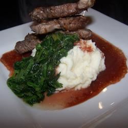 Cumin Lamb Steaks with Smashed Potatoes, Wilted Spinach and Red Wine Sauce 