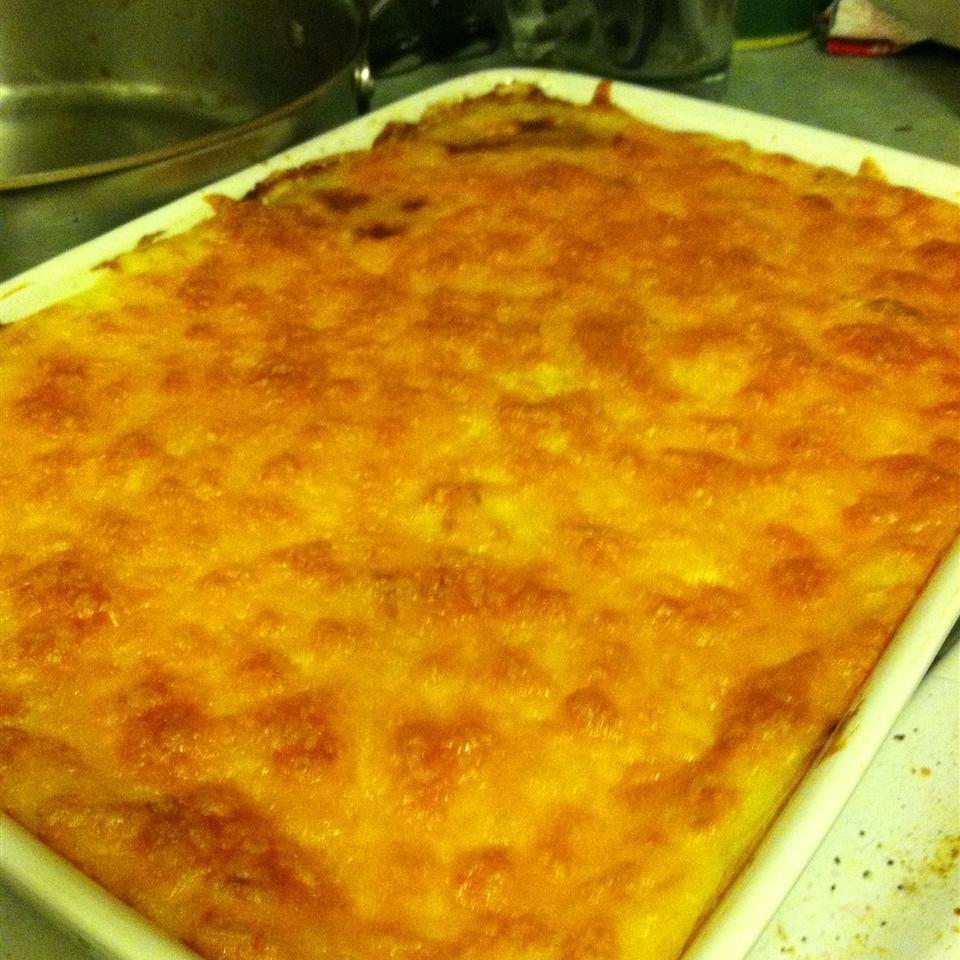 <p>Here's a quick twist on traditional shepherd's pie. Ground beef is seasoned with onion soup mix and layered with canned veggies, mashed potatoes, and Cheddar cheese. "We have made this many times and we love it," says Hollie811. "I definitely use extra potatoes, because I firmly believe you can never have too many potatoes. I also add more butter and milk to the potatoes for more moisture. I choose to use more corn and carrots and no peas. I definitely look forward to when we plan to make this again!"</p>
                          