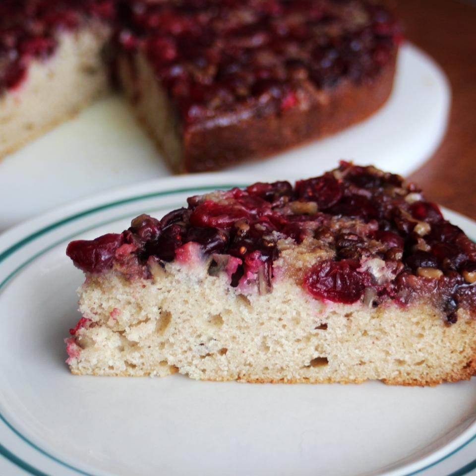 "Delicious! A sweet, flavorful cake with caramel covered pecans and occasional bursts of tart berries," says RueBarbe. "Looks beautiful."
                          