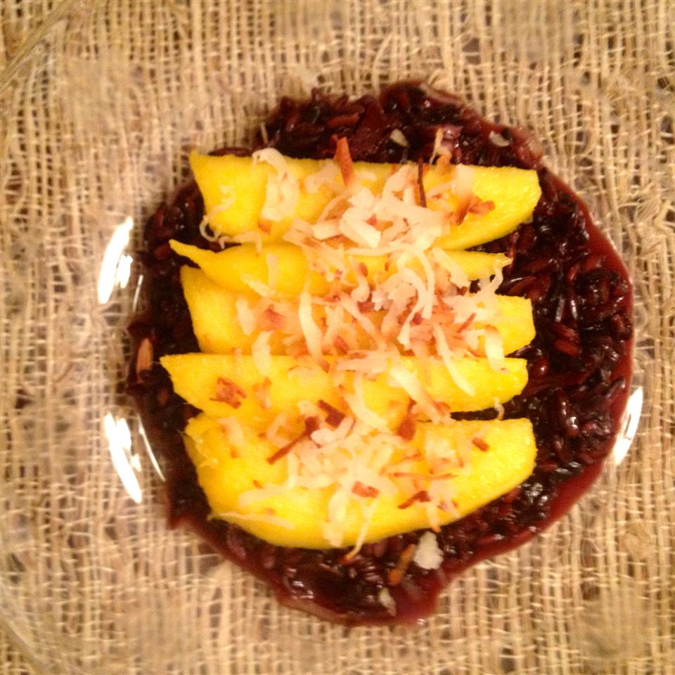 <p>Black sticky rice, fresh mango, and light coconut milk star in this delicious version of a favorite Thai dessert. "This rice is really amazing; the purplish black rice is a wonderful change!" says berriesandcocoa.</p>
                          