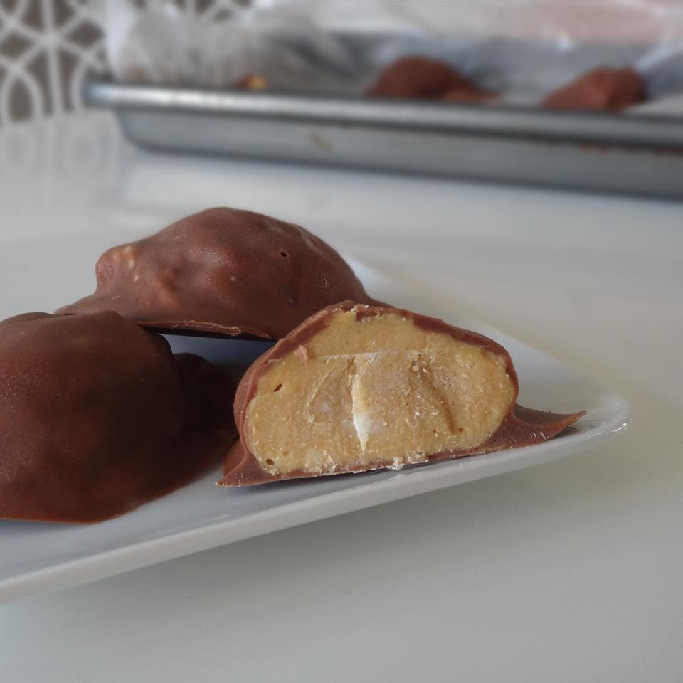 <p>Coconut oil adds a subtle coconut flavor to these peanut butter balls. Some reviewers suggest decreasing the amount of coconut oil to keep the batter from becoming too thin. </p>
                          