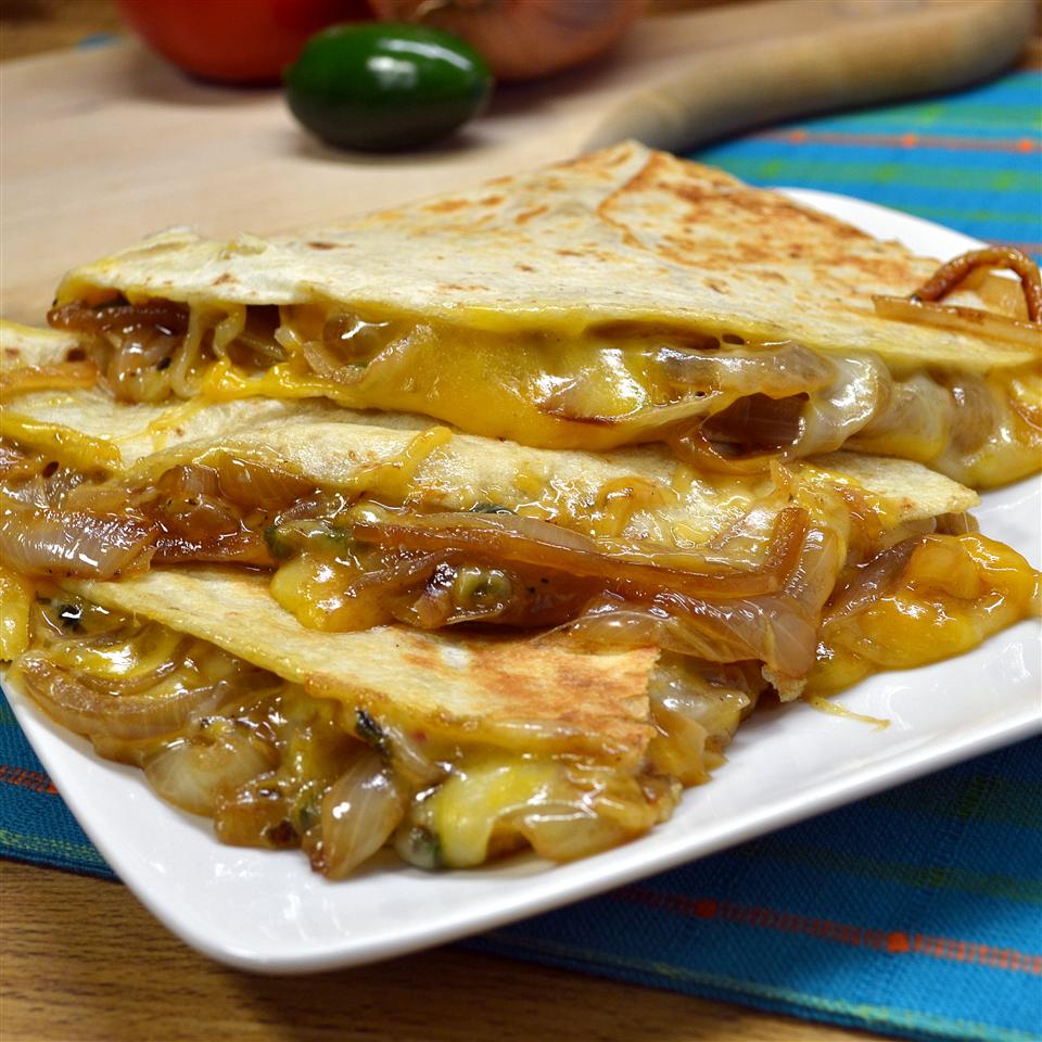 <p>"This is great for an appetizer or meal," says ALICIA26. "You can add meat if you like, but I made a vegetarian option for meatless Monday! Top each quesadilla with sour cream, salsa, lettuce, and guacamole."</p>
                          