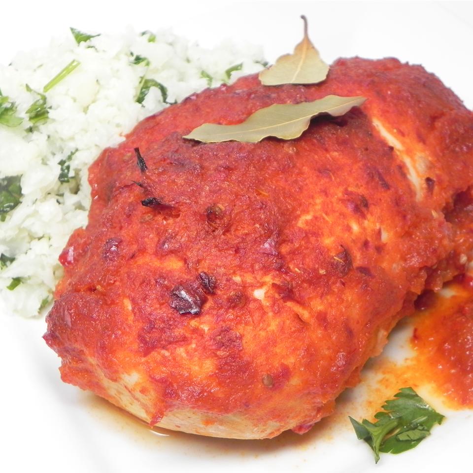 <p>Pollo adobado is a traditional adobo-marinated chicken dish with a very flavorful guajillo pepper and tomato sauce. "Love love loved this recipe," says Chef Roy. "Followed it to the T and I think it came out perfect!"</p>
                          <p>You might also like: </p>
                          