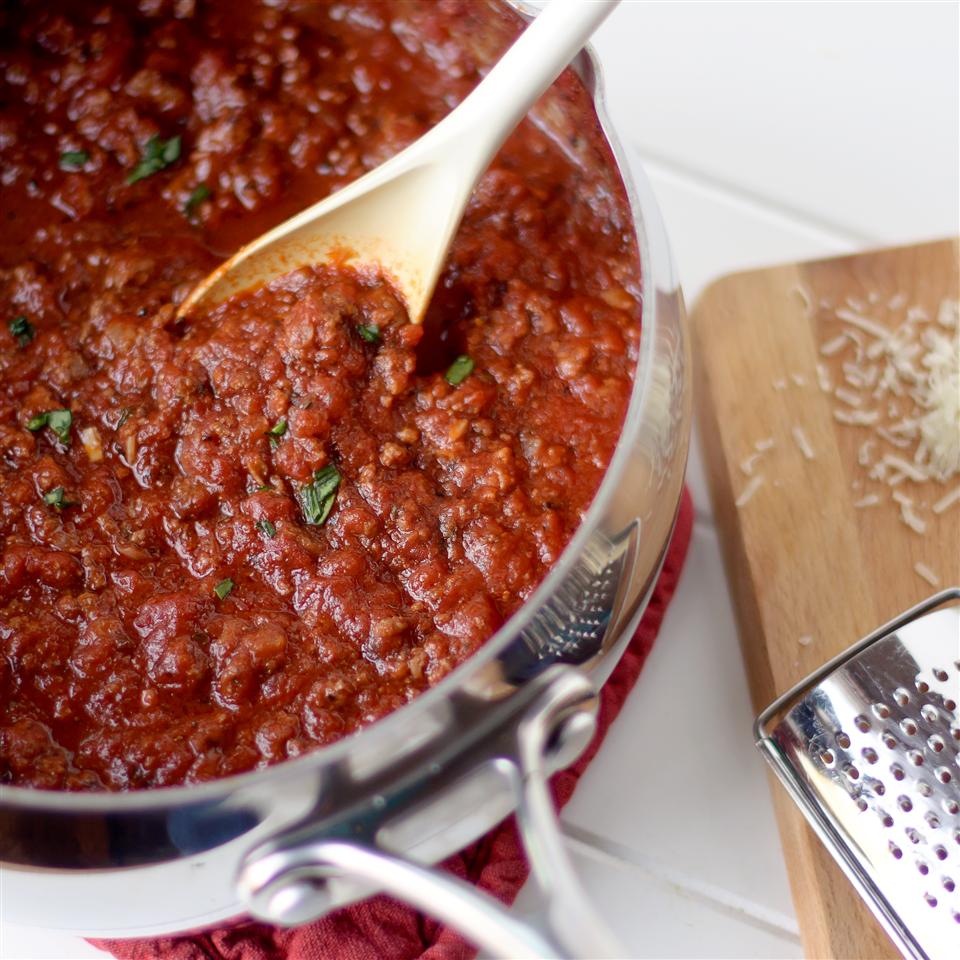 <p>This simple marinara sauce is the kind of satisfying comfort food that goes a long way for not a lot of money. "Melting just a little cheese in the sauce adds great richness without overwhelming the tomatoes," says NMP. "And it's easy to keep these ingredients stocked in the house! Makes for amazing leftovers!"</p>
                          
                          Budget Tip: Hit the bulk section for foods like nuts, beans, grains, and dried pastas.
                          
                          