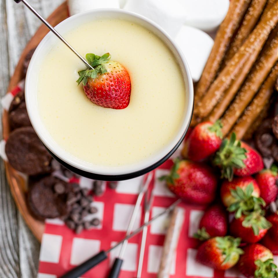<p>"Rich creamy white chocolate fondue, made with real cream!" says recipe creator RusticJoyfylFood. "Perfect for a party or a romantic night in. Assemble tasty things to dip like pretzel rods, brownies, marshmallows and assorted fruits. Enjoy!"</p>
                          