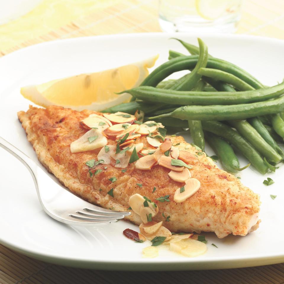 <p>Here, we use healthier extra-virgin olive oil with a bit of butter added for its flavor instead of the tablespoons of butter usually used to make classic "amandine" sauce for pan-fried catfish fillets. The results are delicately flavored and have only a third of the calories, fat and sodium of a classic version.</p>
                          