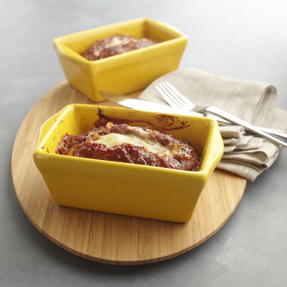 <p>Individual meatloaves not only take the guesswork out of portion size, they cook quicker than a large loaf. Look for ground chipotle in the spice section of the market--it gives the glaze a hit of smoke and spice. Serve with roasted broccoli and brown rice tossed with cilantro.</p>
                          