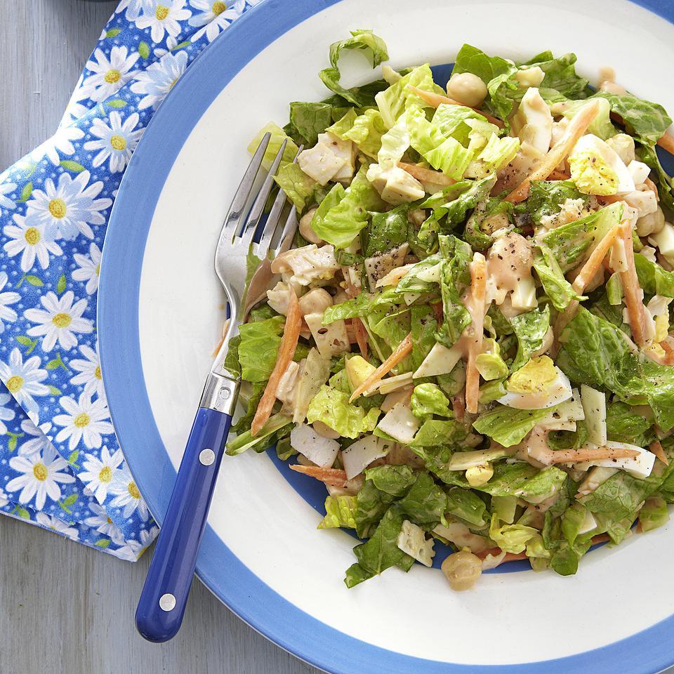 <p>We gave a classic chef's salad recipe a healthy makeover with our own homemade healthy Thousand Island dressing recipe and reduced-sodium cheese and turkey. Those swaps slashed 260 calories and nearly a day's worth of sodium (2,131 mg!) per serving compared with traditional recipes.</p>
                          