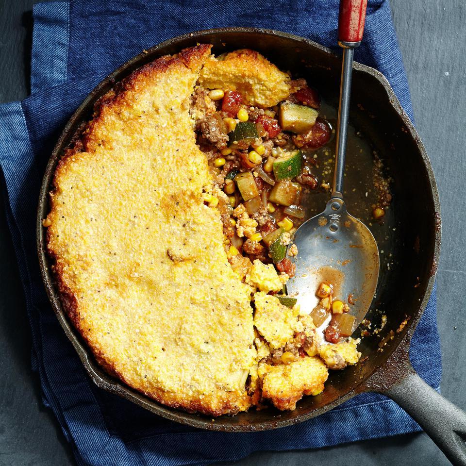<p>In this healthy casserole recipe--sometimes called tamale pie--the cornbread gets crusty at the edges, thanks to a cast-iron skillet. For the best texture, use yellow cornmeal with a medium grind. Serve with lime wedges for a little extra tang.</p>
                          
