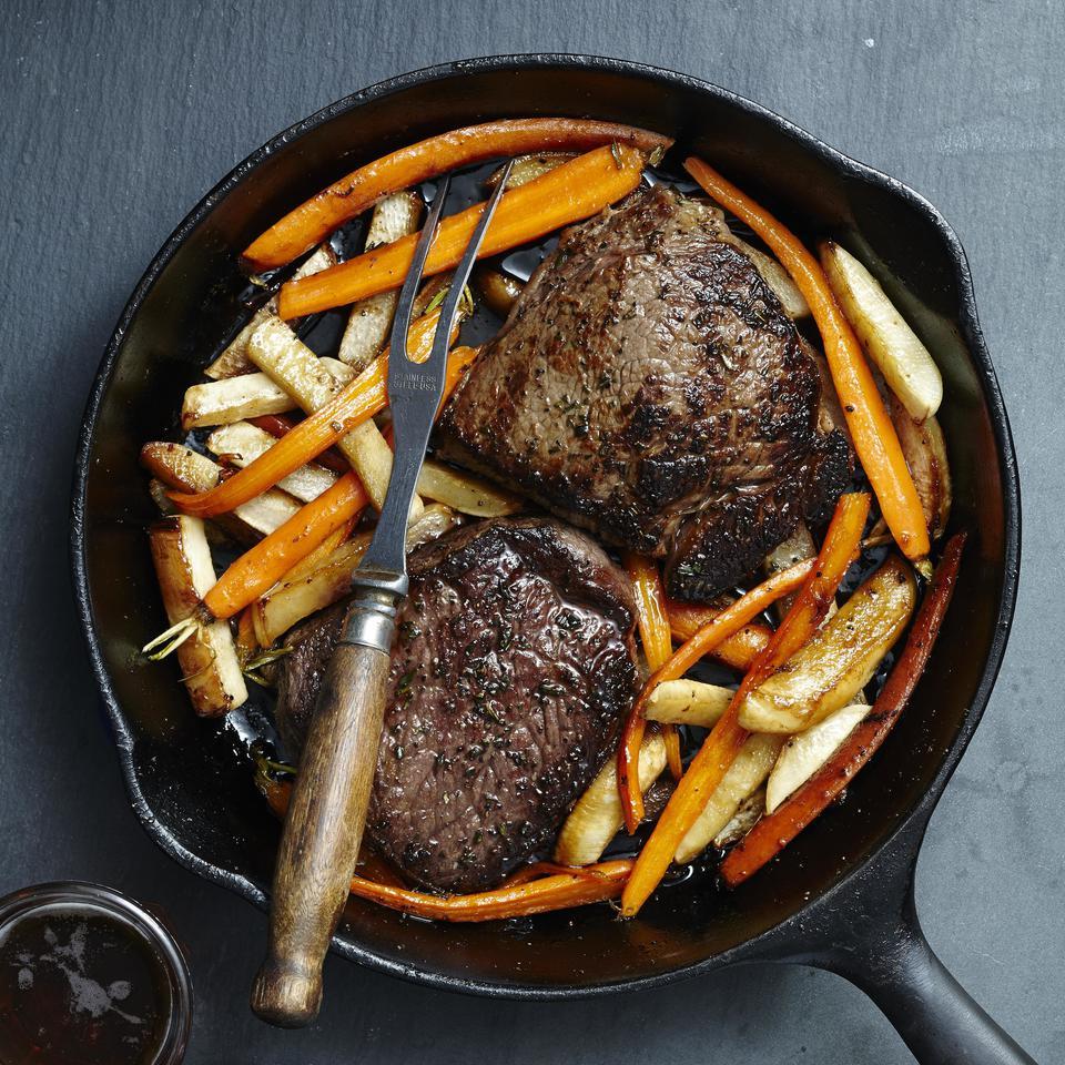 <p>This cast-iron steak recipe has what it takes to transform beef and vegetables from basic to brilliant--a pop of rosemary on the steak, an intense sear in a hot skillet and a sweet-and-sour glaze on the vegetables. Serve with sautéed spinach and a glass of red wine.</p>
                          