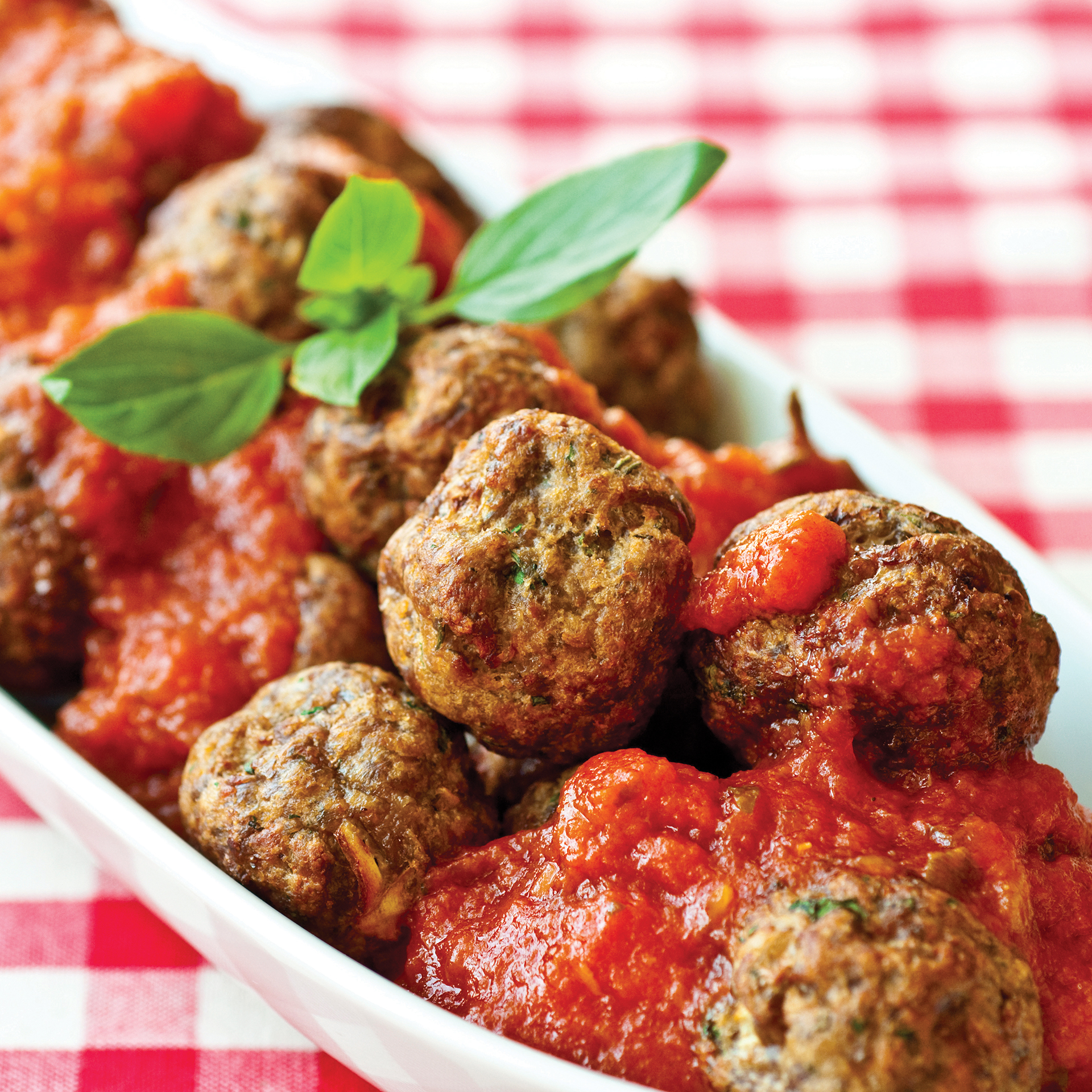 Fried meatballs in tomato sauce
