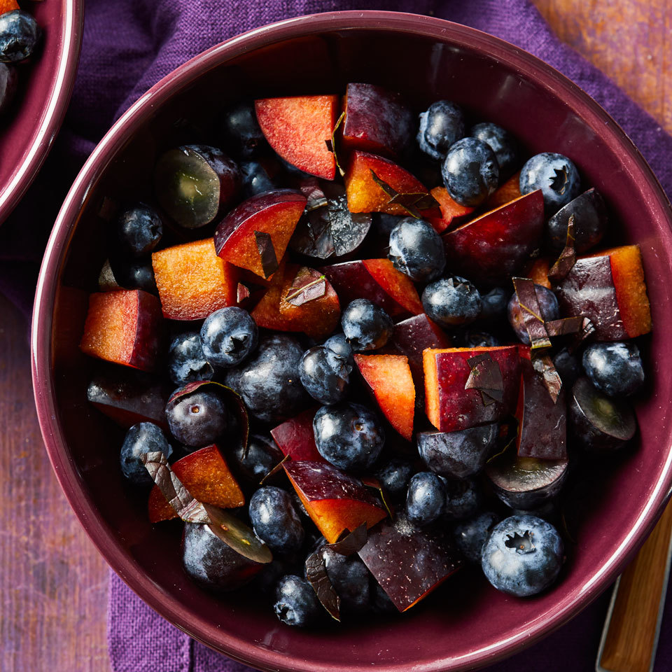 <p>Serve this refreshing fruit salad featuring juicy plums, grapes and berries on its own or with other colorblock fruit salads (like red, green and orange) for a fun, crowd-pleasing rainbow side dish.</p>
                          