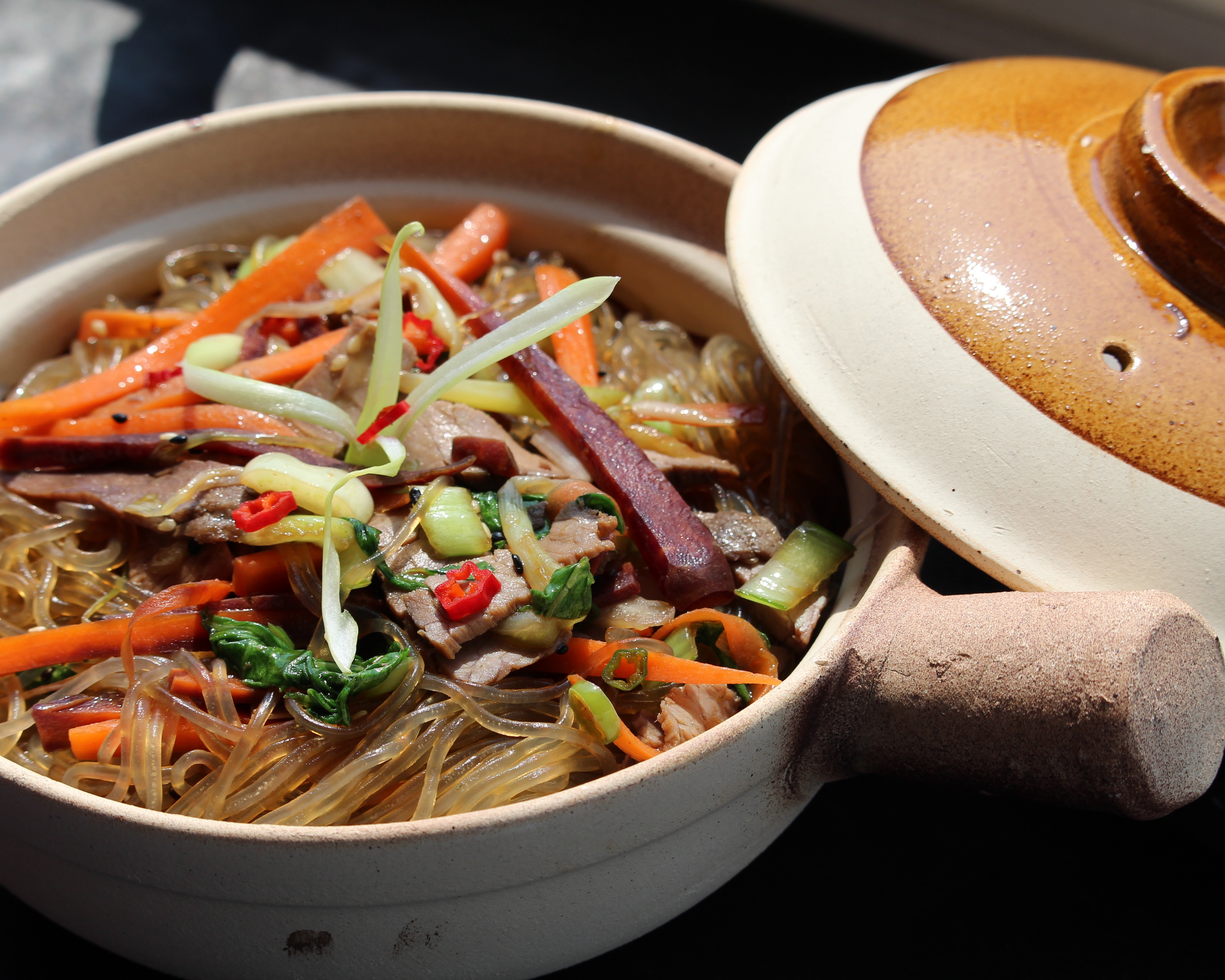 <p>Vermicelli noodles, vegetables, and beef are tossed with a homemade japchae soy-sesame sauce for an authentic Korean dish. Garnish with toasted sesame seeds for crunch. Try it with strips of pork, chicken, shrimp, or tofu, if you prefer.</p>
                          