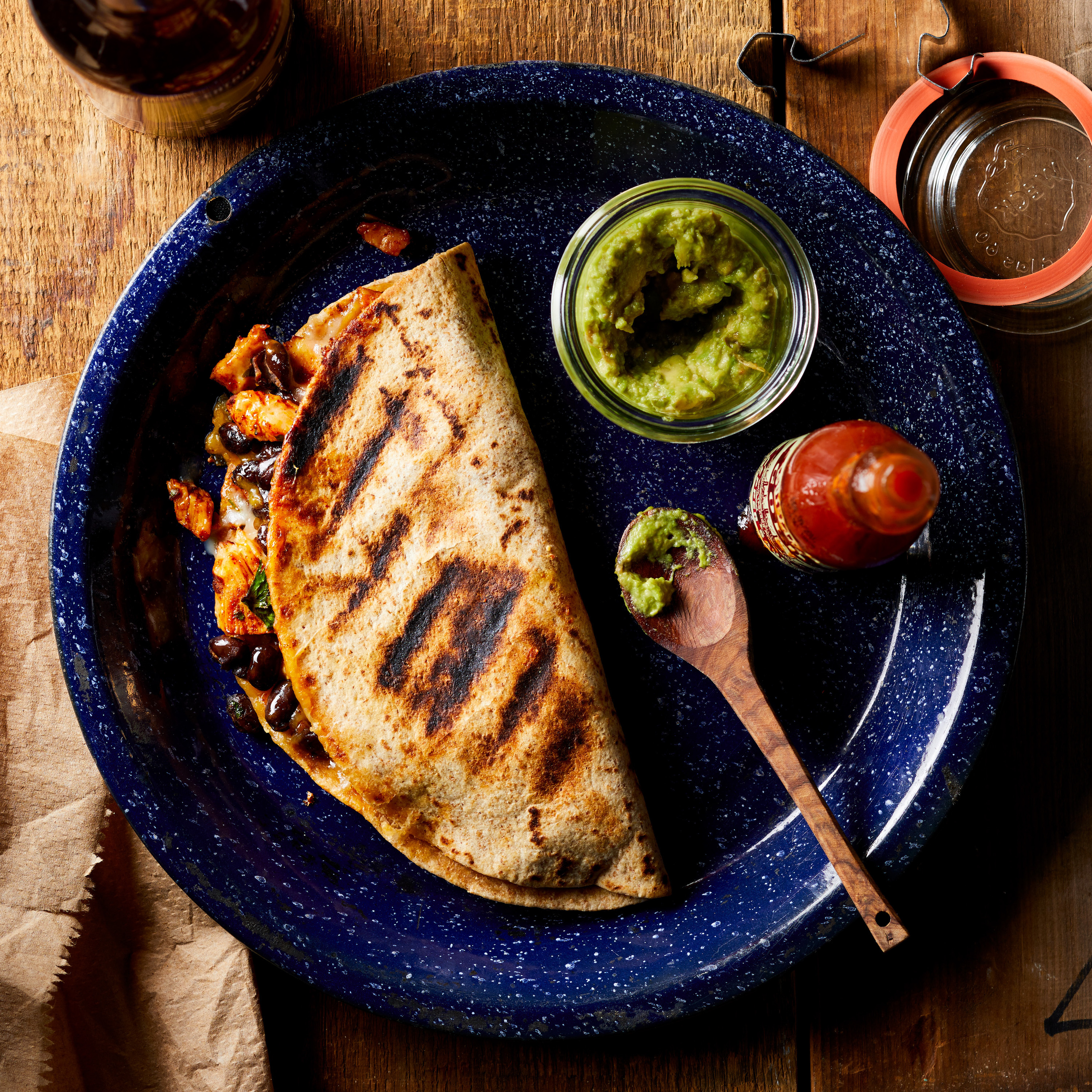 <p>These make-ahead quesadillas are a genius campfire dinner solution. Assemble and wrap in foil at home, then once you get to camp, just throw over hot coals for a quick campsite meal.</p>
                          