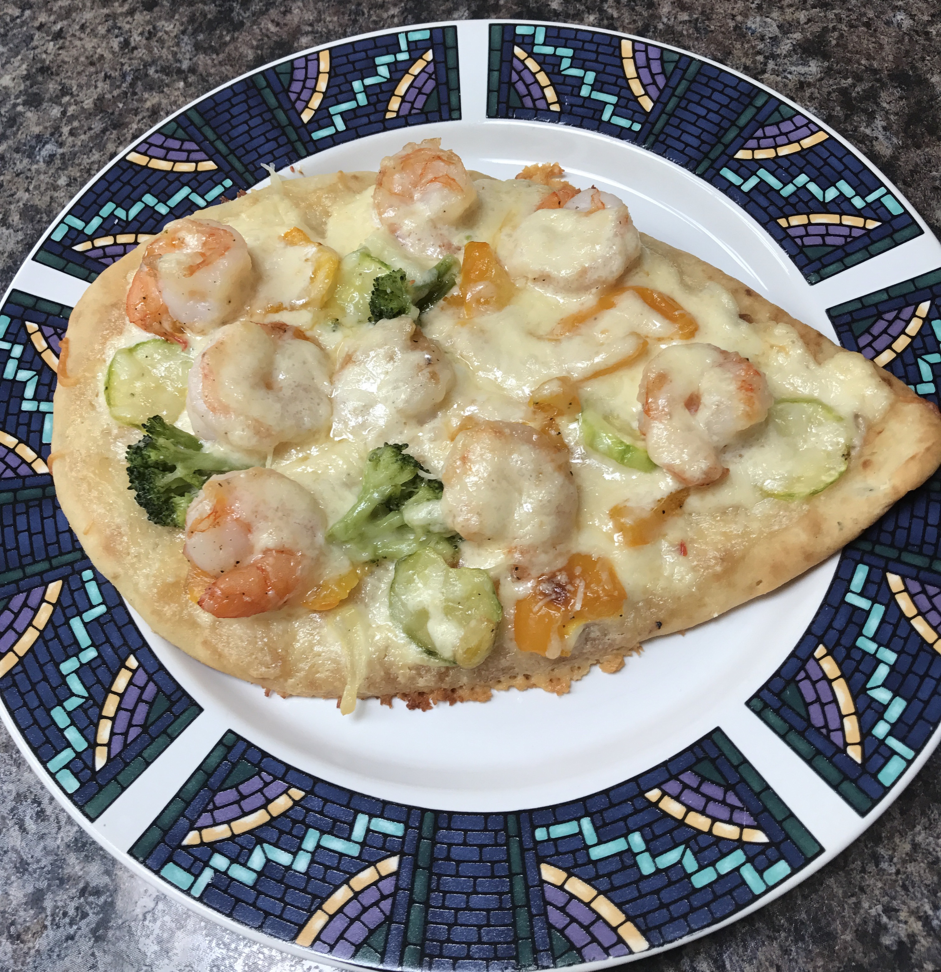 <p>Shrimp Alfredo gets a quick pizza makeover with fresh veggies, Italian cheeses, and a crispy naan crust.</p>
                          