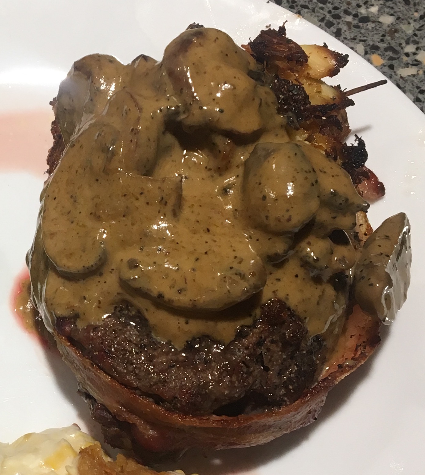Crab-Stuffed Filet Mignon with Whiskey Peppercorn Sauce 