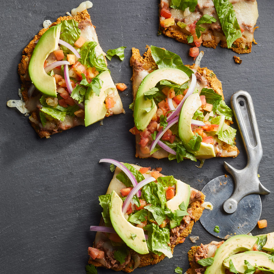<p>Imagine all your favorite nacho ingredients piled onto a warm, toothsome giant tortilla. Pretty good, right? Now make this healthy pizza recipe and see if you were right. Serve with lime wedges.</p>
                          